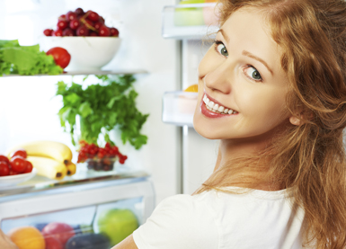 Woman with healthy fridge